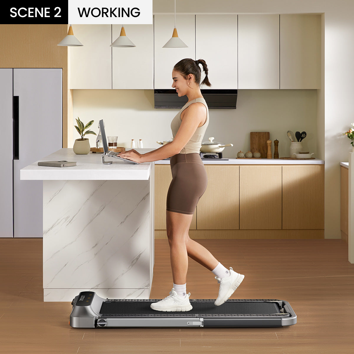Person using WalkingPad R2 as an under-desk treadmill