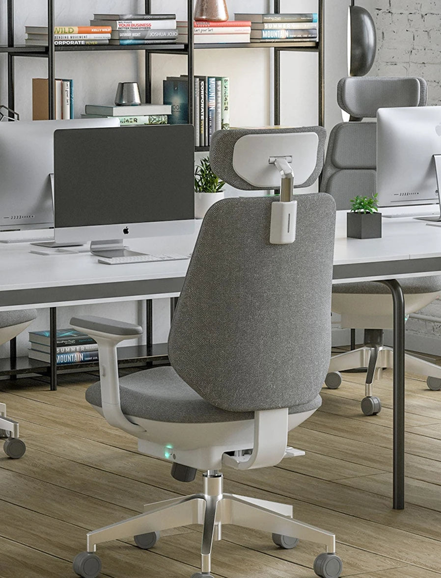 Product shot highlighting Air-Smart chair's auto-following lumbar support mechanism