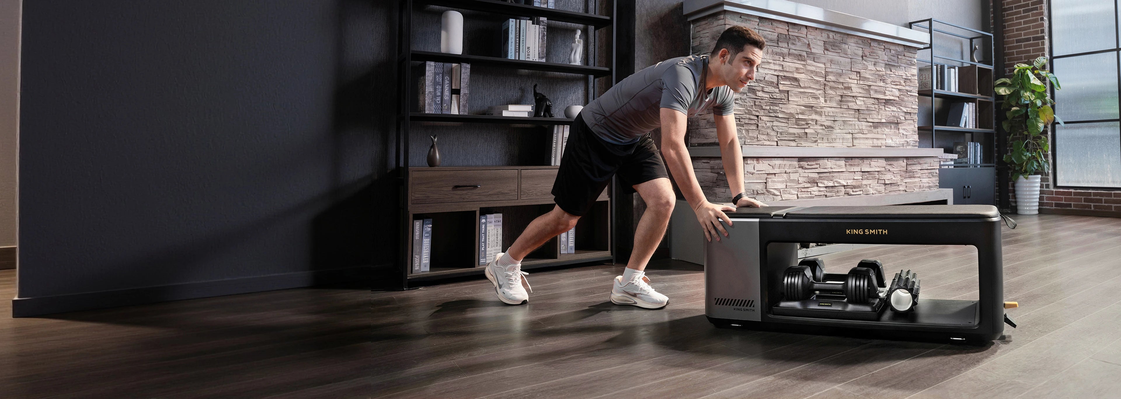 Man exercising on a WalkingPad adjustable weight bench for home strength training 
