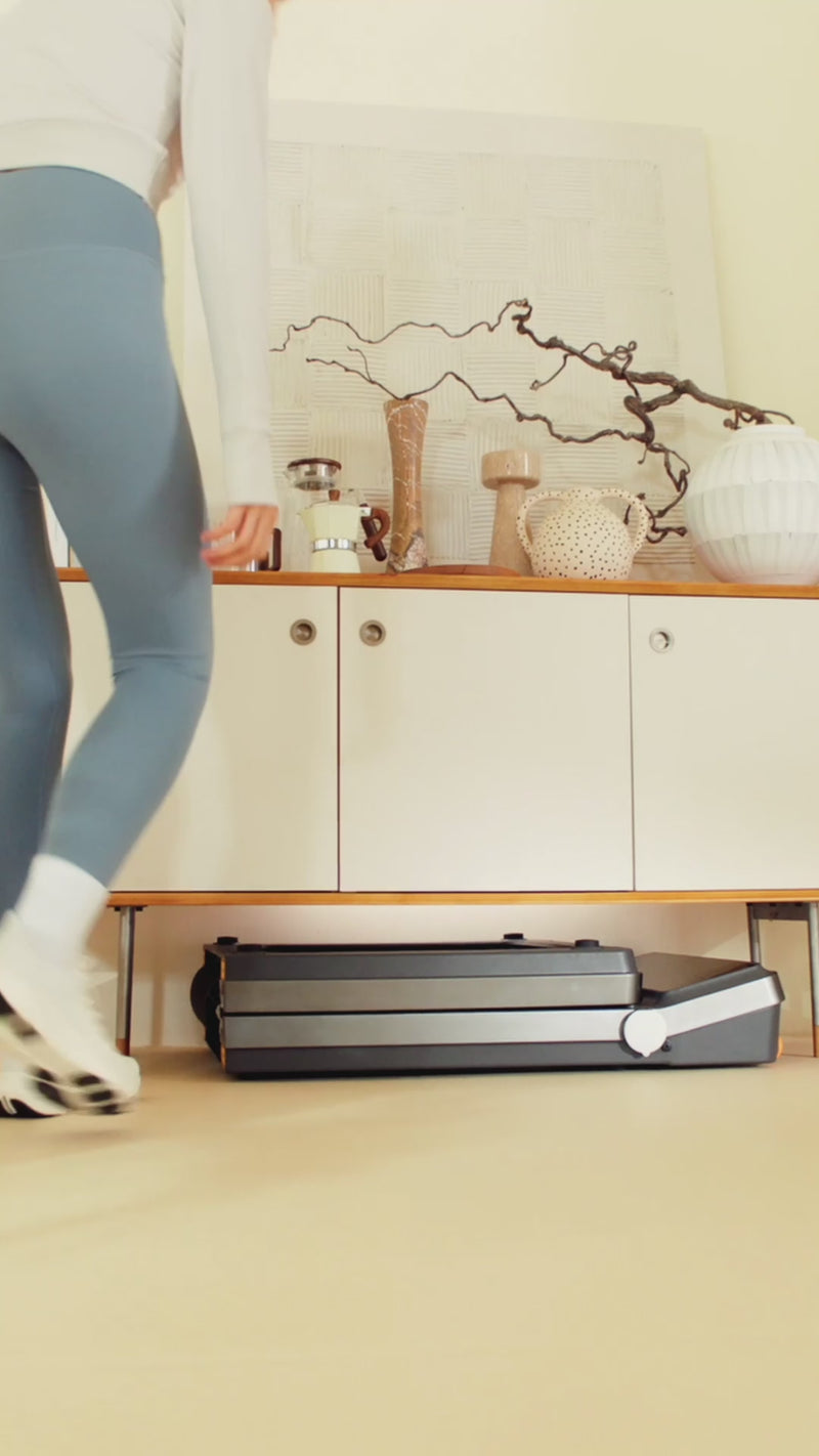 WalkingPad Z3 treadmill used under desk for walking while working at home