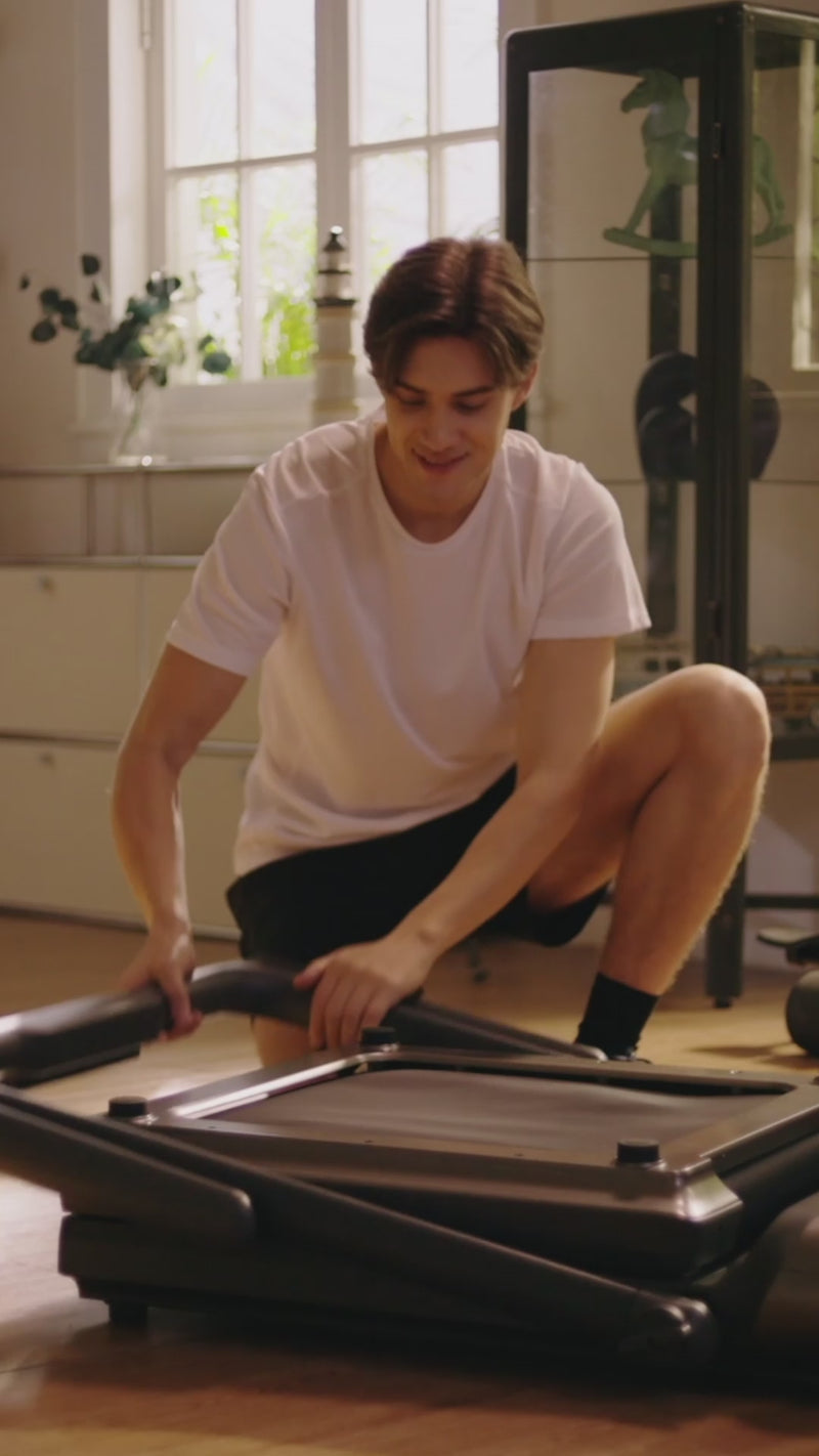 WalkingPad R3 Hybrid Plus treadmill home workout demonstration in a living room setting
