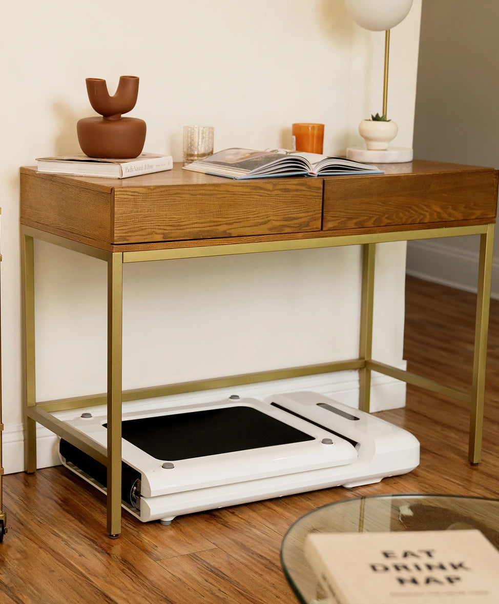 WalkingPad C2 walking pad stored under desk for compact space saving