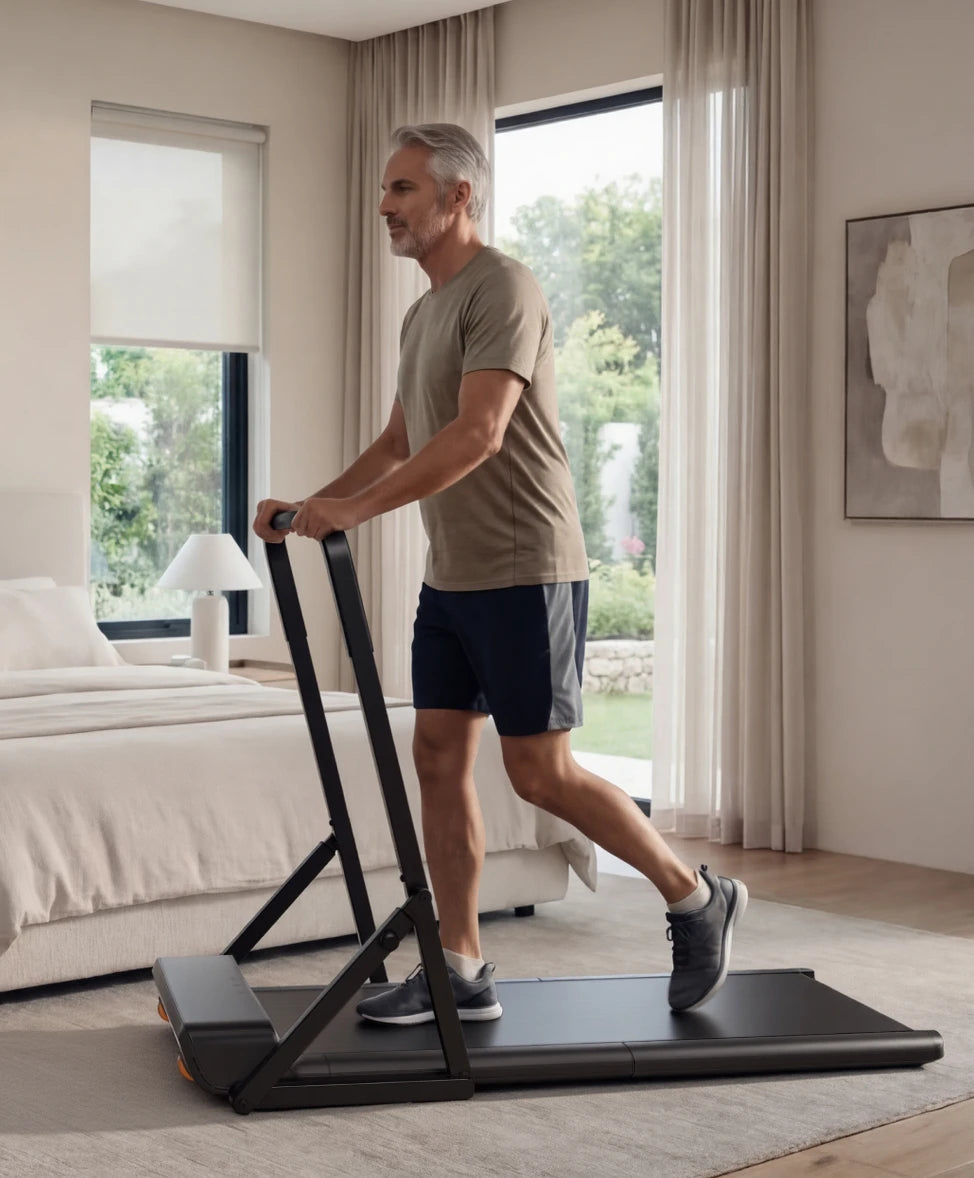man using treadmill with handrail home walking exercise