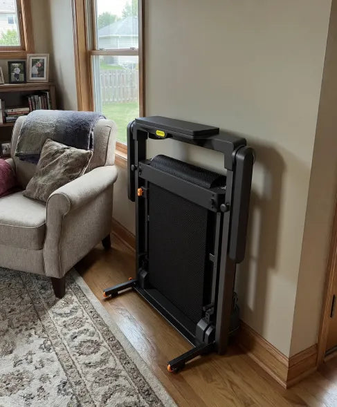 WalkingPad MX10 vertical fold treadmill stored upright to save space at home