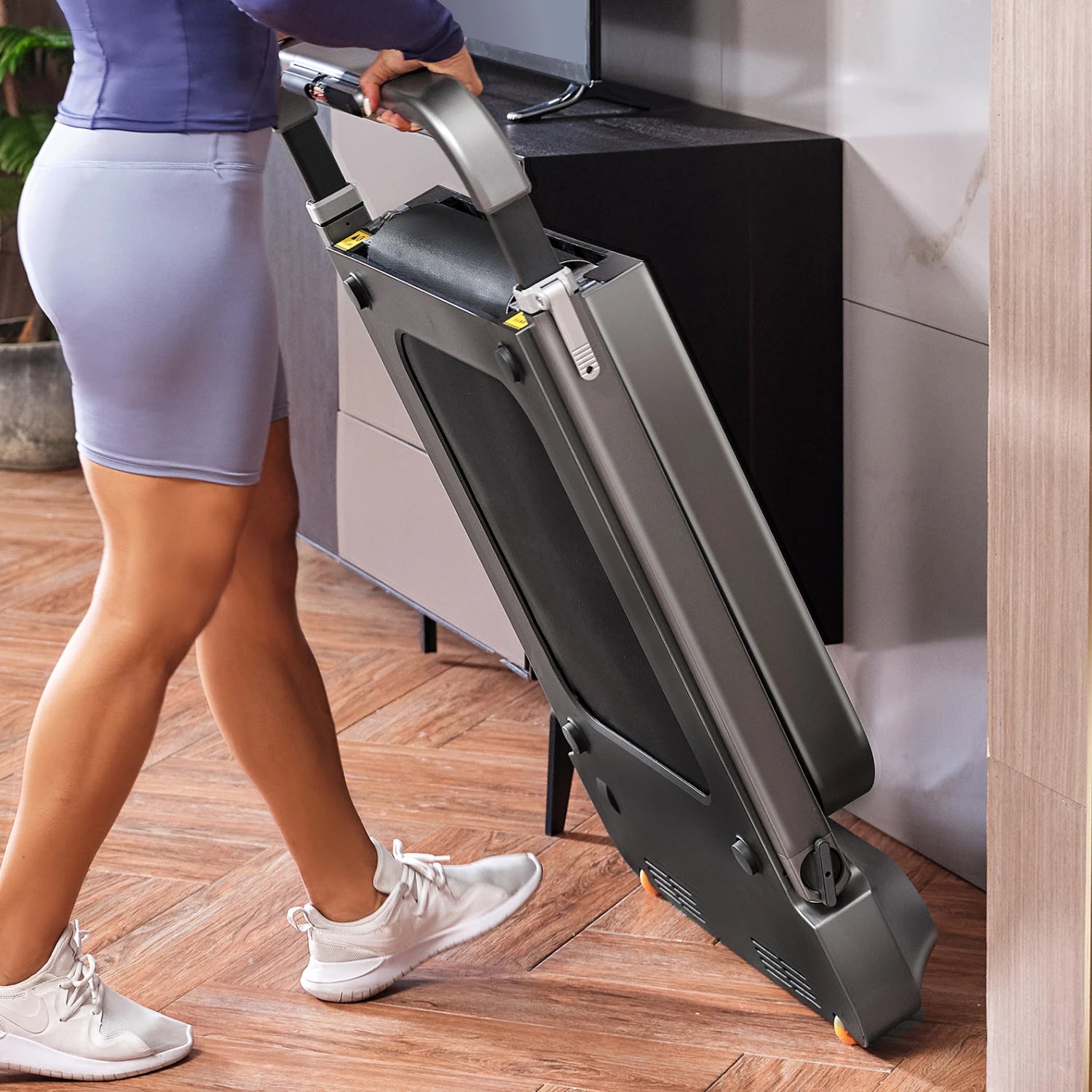 WalkingPad R2 treadmill with built-in wheels for easy movement and storage