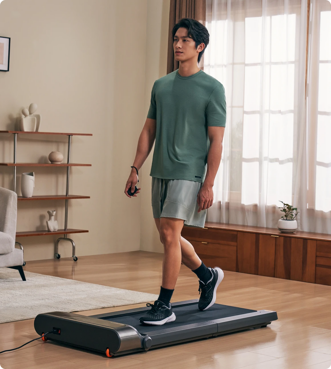 WalkingPad R3 treadmill used for casual walking exercise at home
