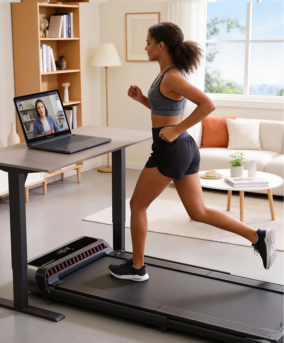 Woman walking on WalkingPad R3 Hybrid treadmill while working at a standing desk