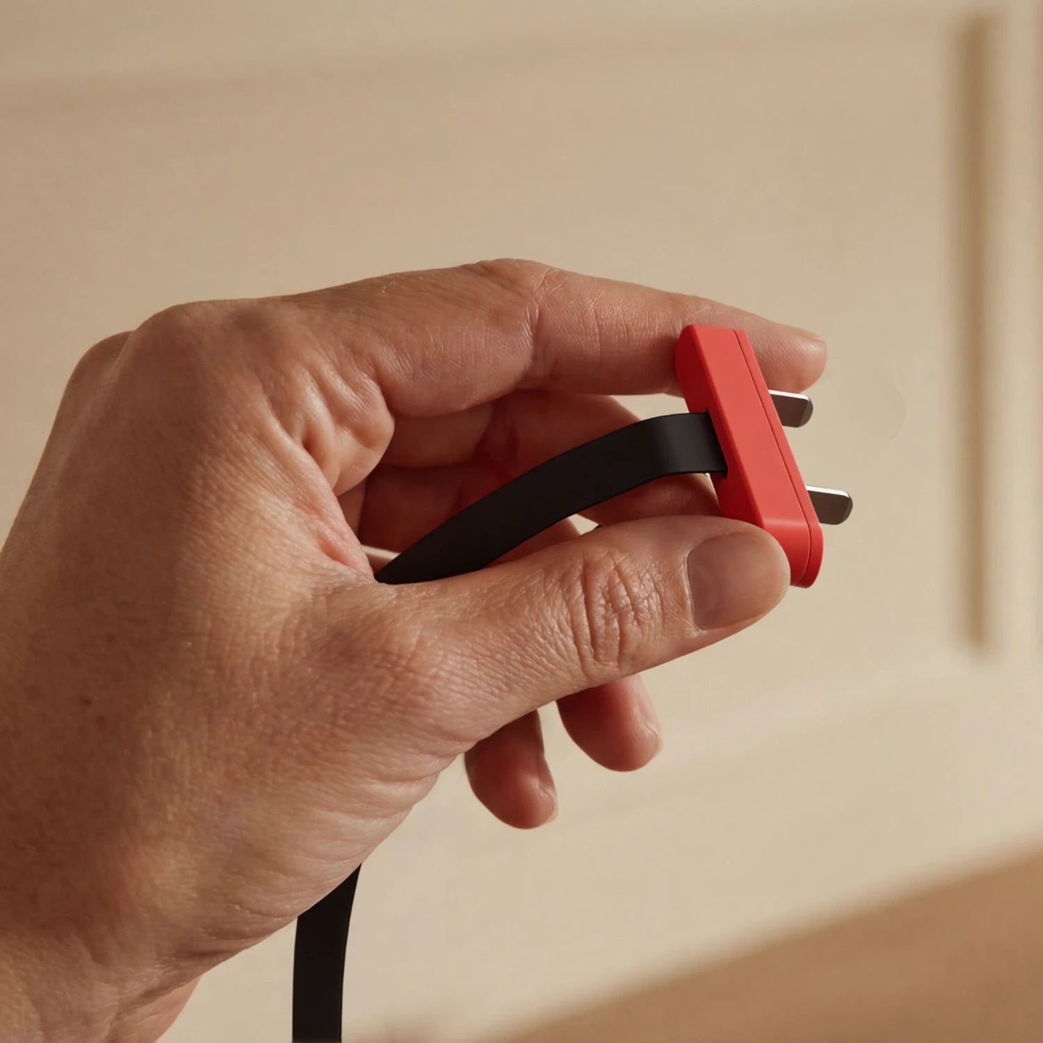 hand holding treadmill safety key emergency clip detail close up