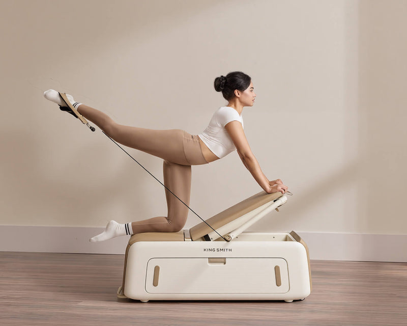 Woman exercising on a WalkingPad adjustable weight bench for home strength training 