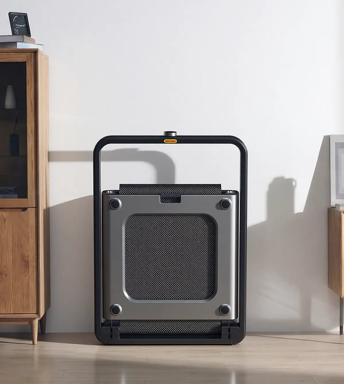 WalkingPad X21 foldable treadmill stored upright using the signature vertical fold design
