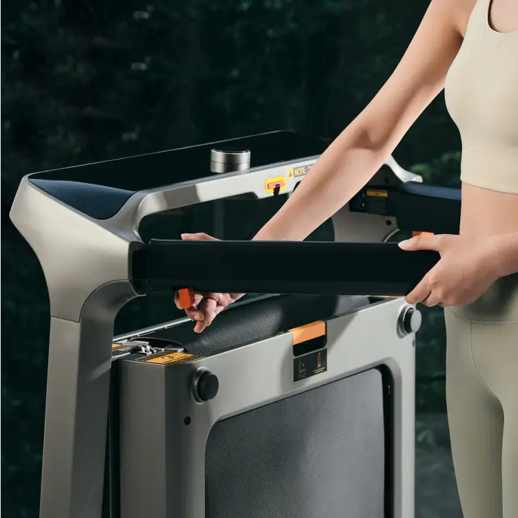 Foldable side handles on the WalkingPad X218 treadmill providing extra support during workouts