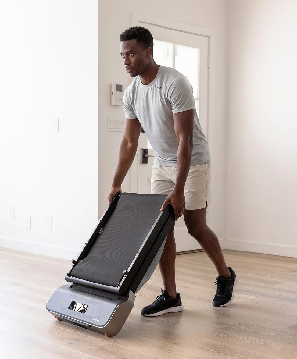 WalkingPad Z1 walking pad folded upright and moved easily with wheels