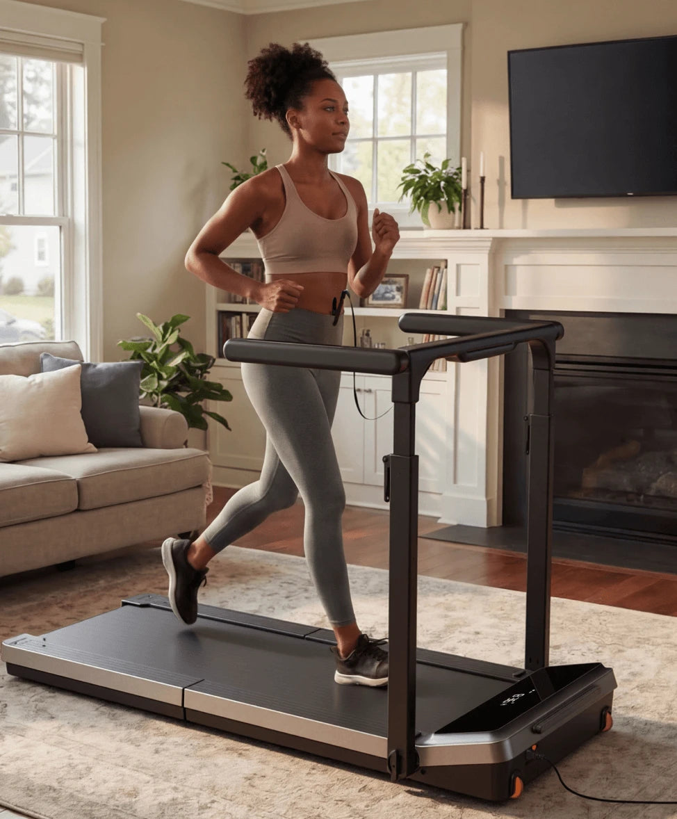 Woman walking on WalkingPad Z3 Hybrid Plus treadmill while working at a standing desk in a bright home