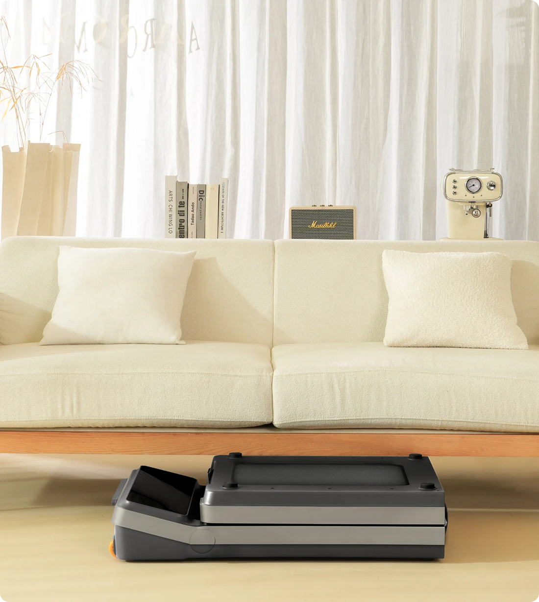 WalkingPad Z3 walking pad stored under sofa for compact home storage
